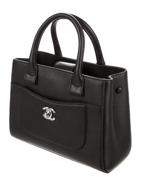 Chanel Mini Neo Executive Bag .